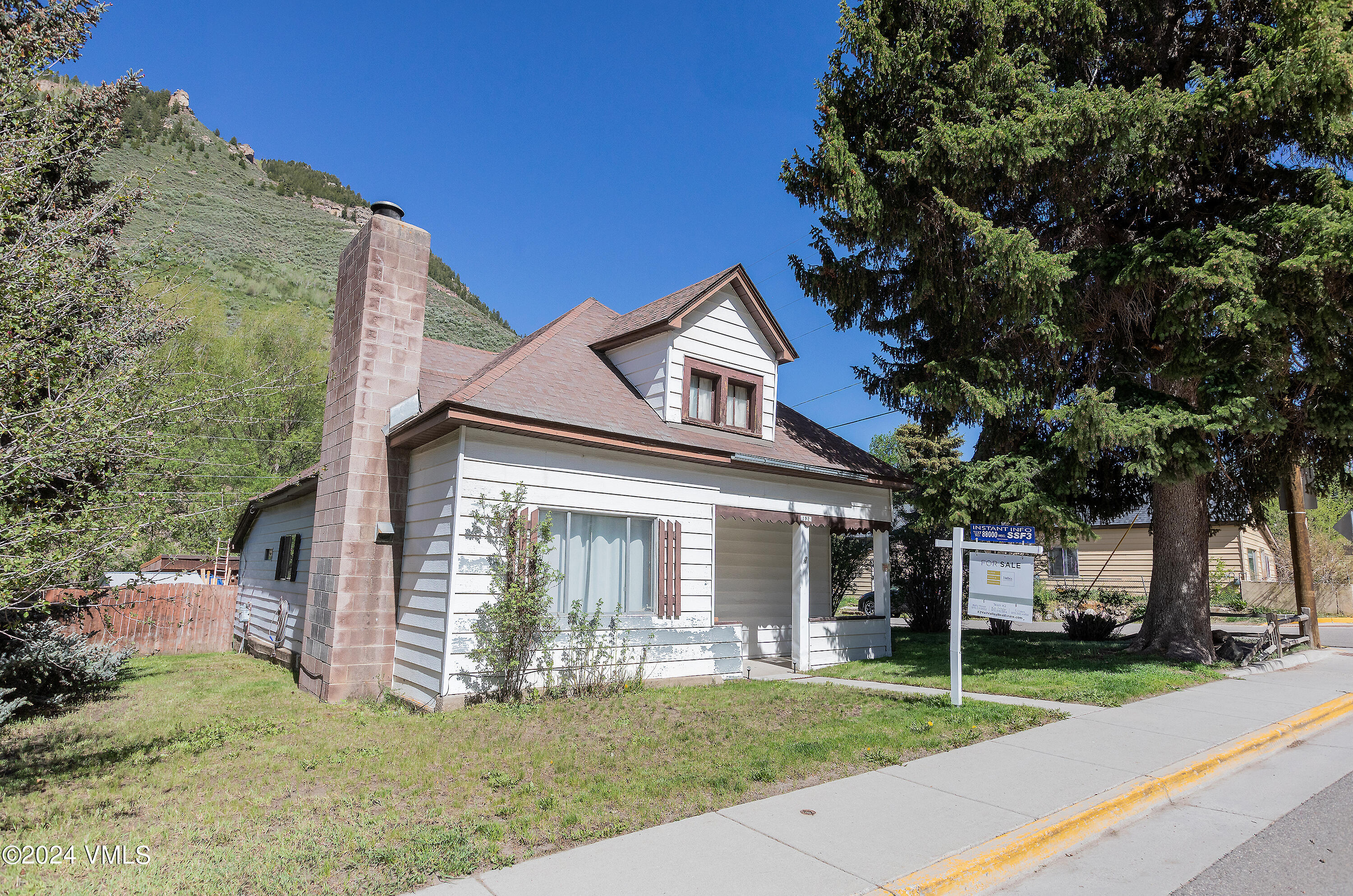 192 Main Street Minturn, CO 81645 - Photo 2 of 11 front view of a house with a yard