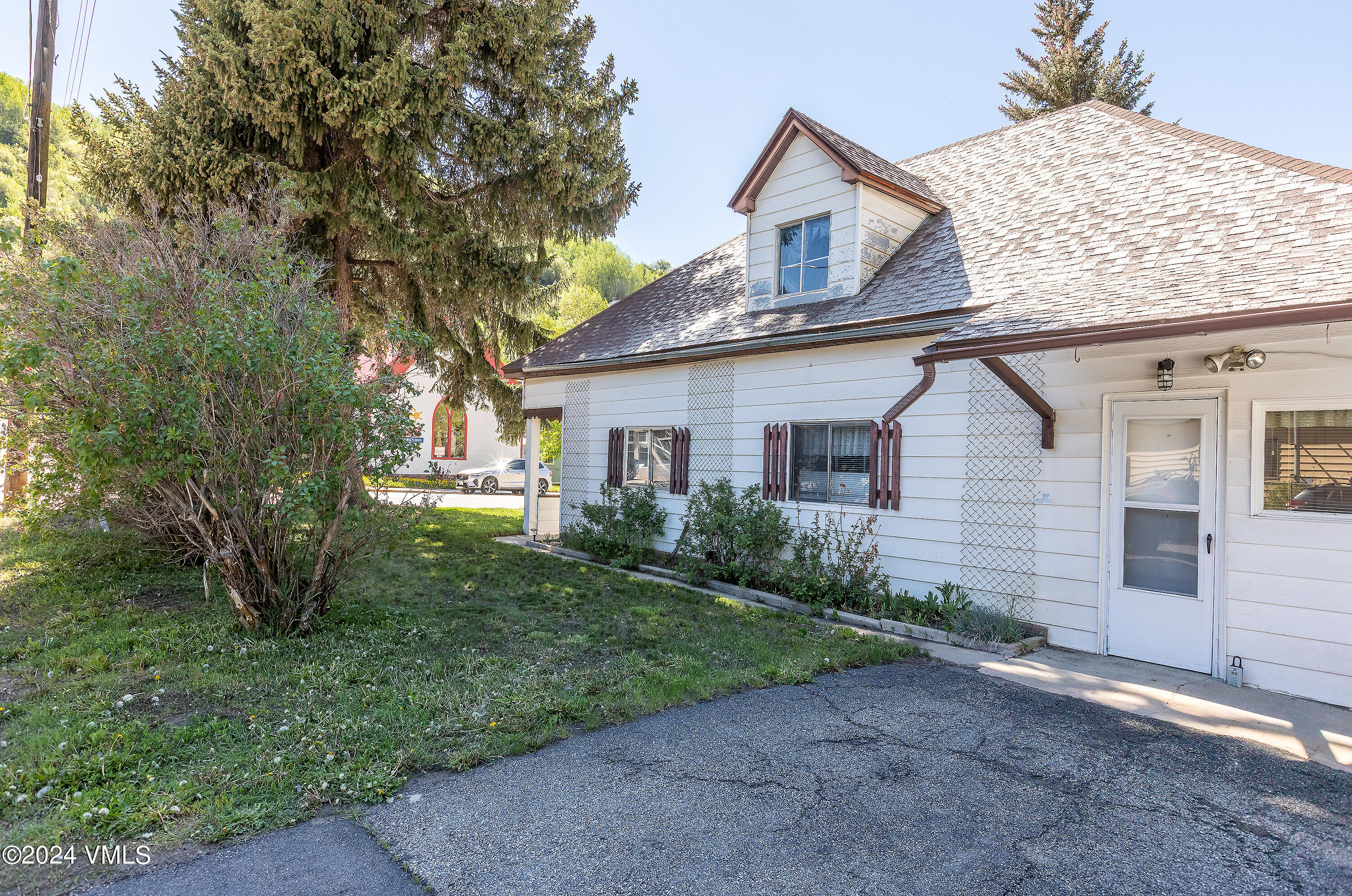 192 Main Street Minturn, CO 81645 - Photo 3 of 11 a view of a house with a yard