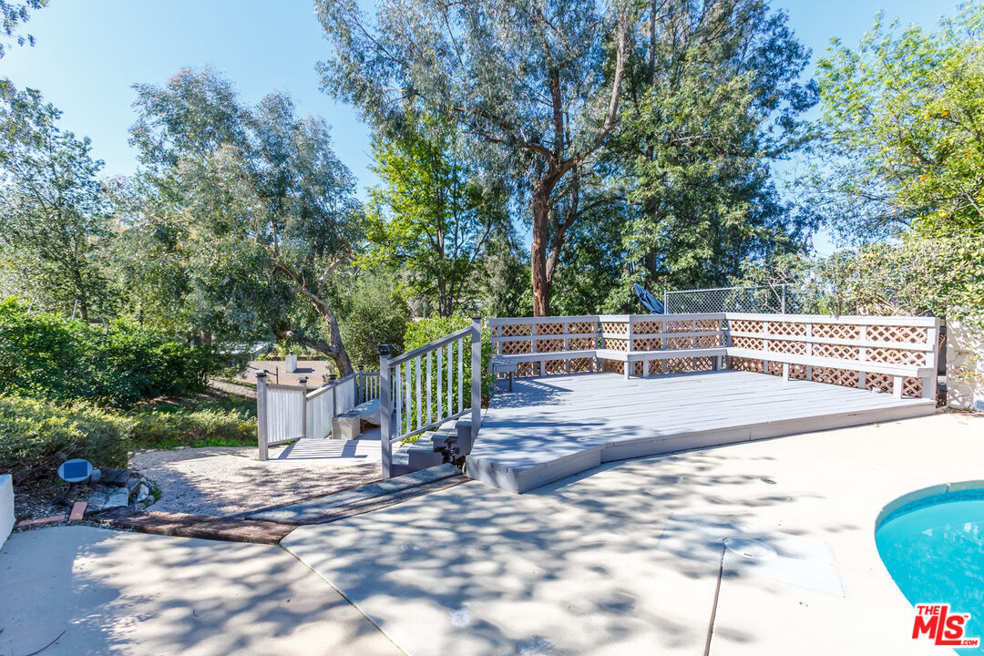 4831 Rosa Road Woodland Hills, CA 91364 - Photo 21 of 27 a view of a yard with plants and trees