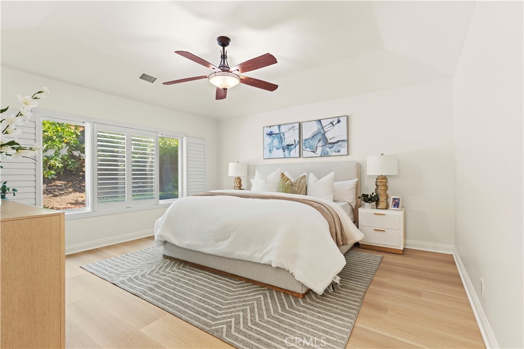 13 Grant Irvine, CA 92620 - Photo 15 of 27 a spacious bedroom with a large bed and a window