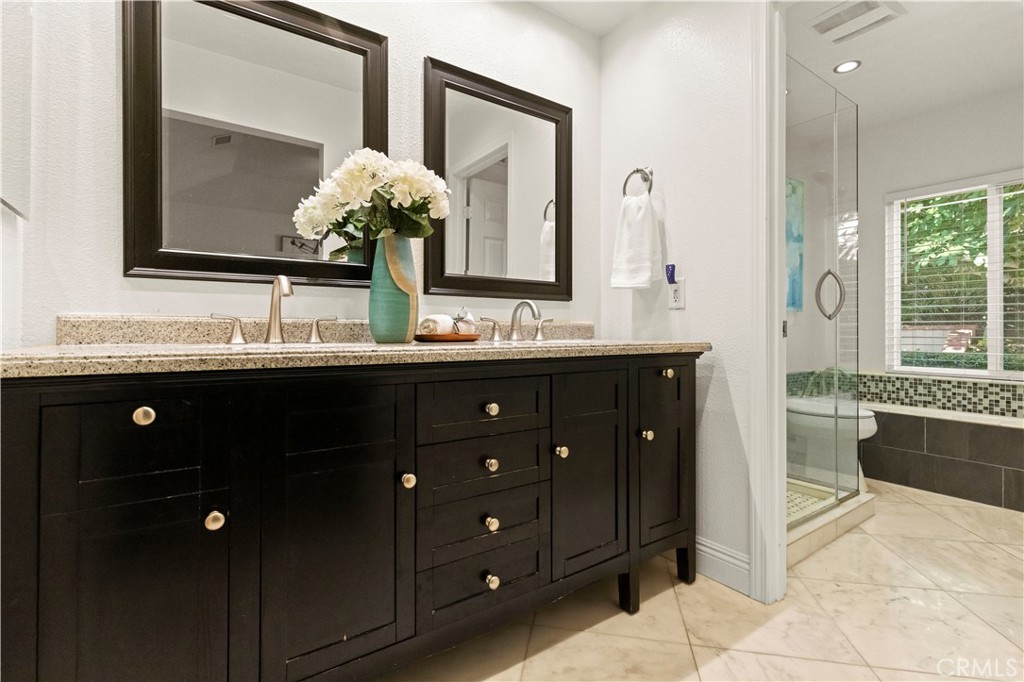 13 Grant Irvine, CA 92620 - Photo 21 of 27 a bathroom with a double vanity sink mirror and double