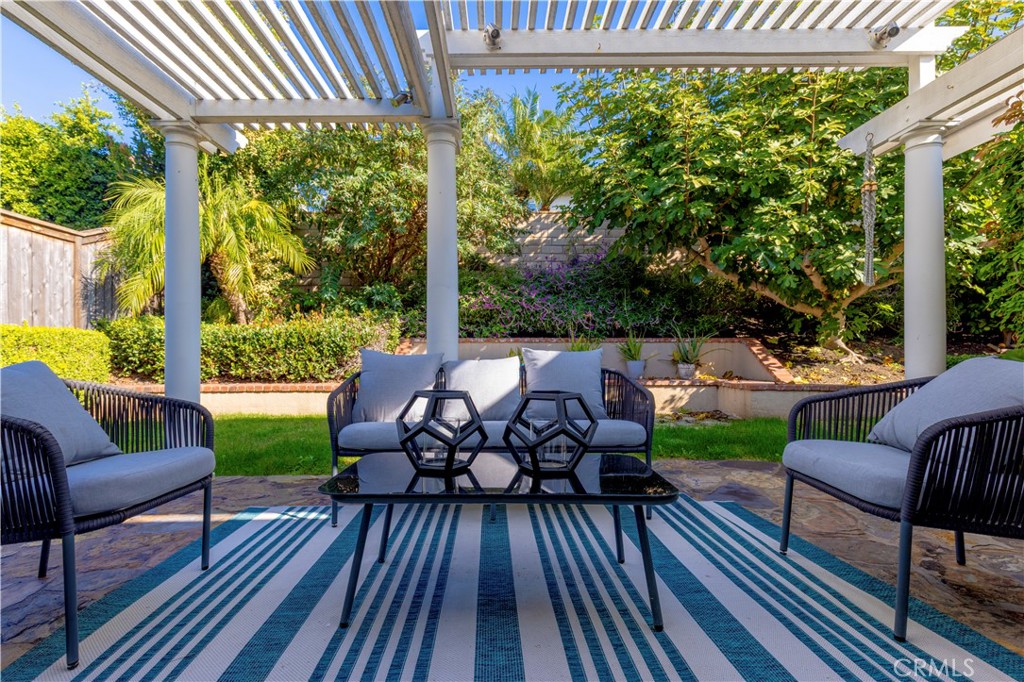 13 Grant Irvine, CA 92620 - Photo 25 of 27 a view of a patio with couple of chairs and a patio