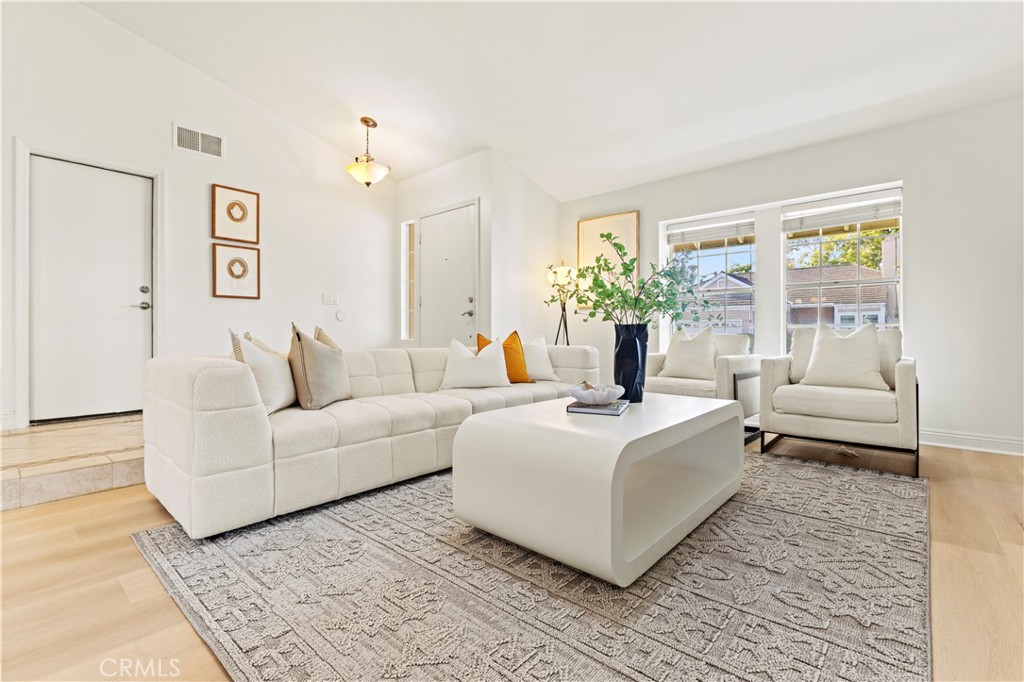 13 Grant Irvine, CA 92620 - Photo 5 of 27 a living room with furniture and a large window