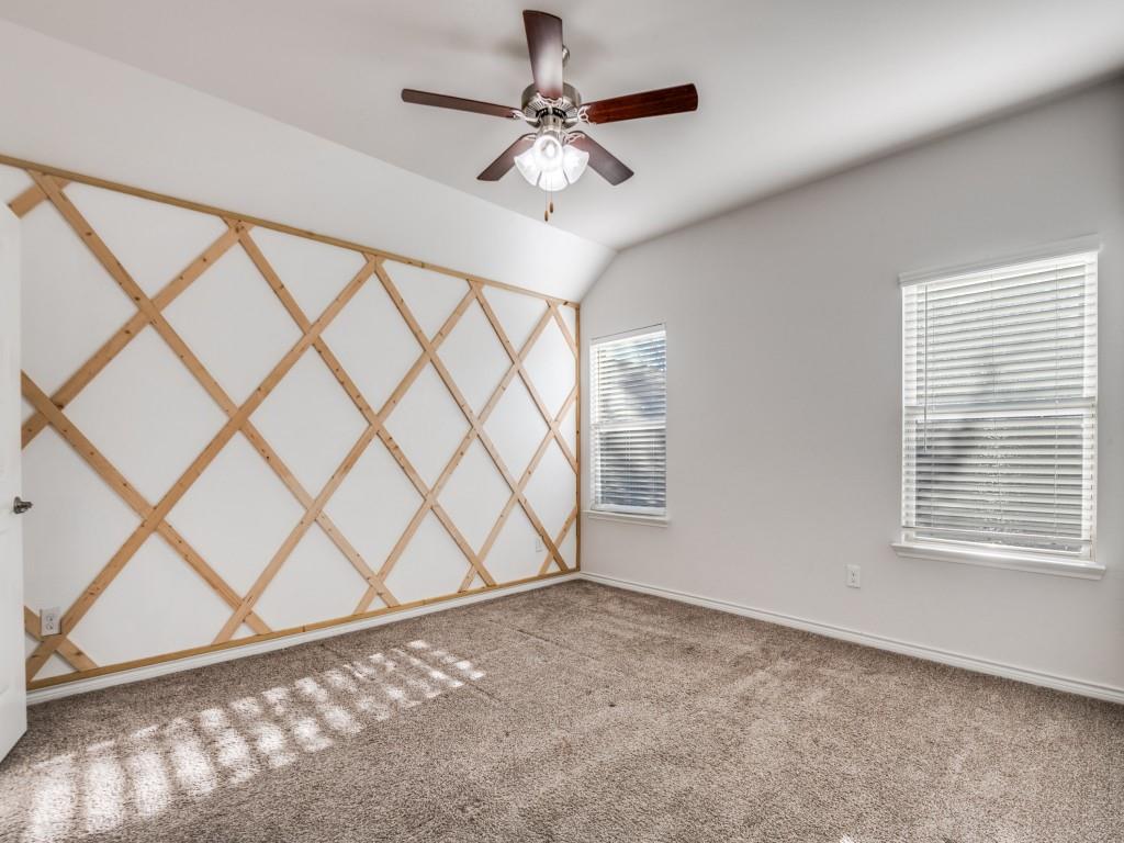 2804 Lenham Lane Forney, TX 75126 - Photo 10 of 12 a view of a livingroom with a ceiling fan and window