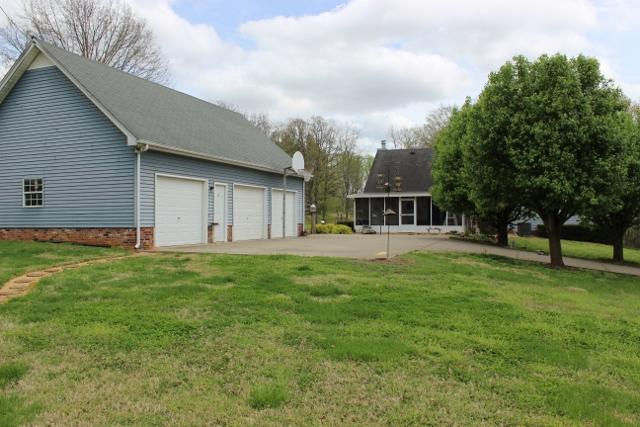 3520 New Chapel Road Springfield, TN 37172 - Photo 3 of 20 Detached 3 Car Garage, 3rd Bay Setup As Workshop, 2 Pedestrian Doors, Automatic Door Openers, Concrete Pad At Garage Area to House
