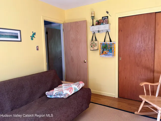 a bathroom with a granite countertop shower and a sink