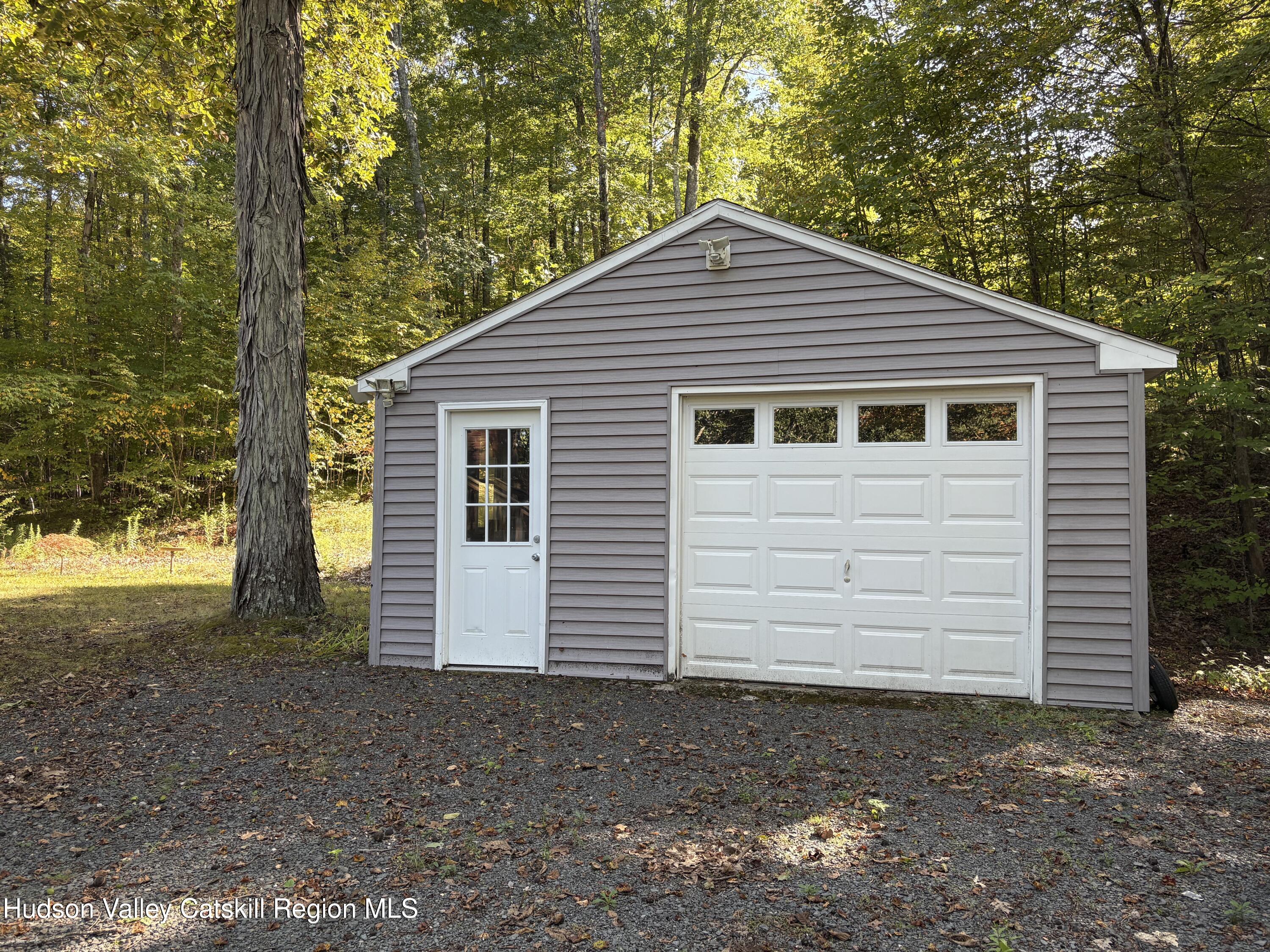 336 Ashley Hill Road Chatham, NY 12024 - Photo 21 of 27 a front view of a house with a yard