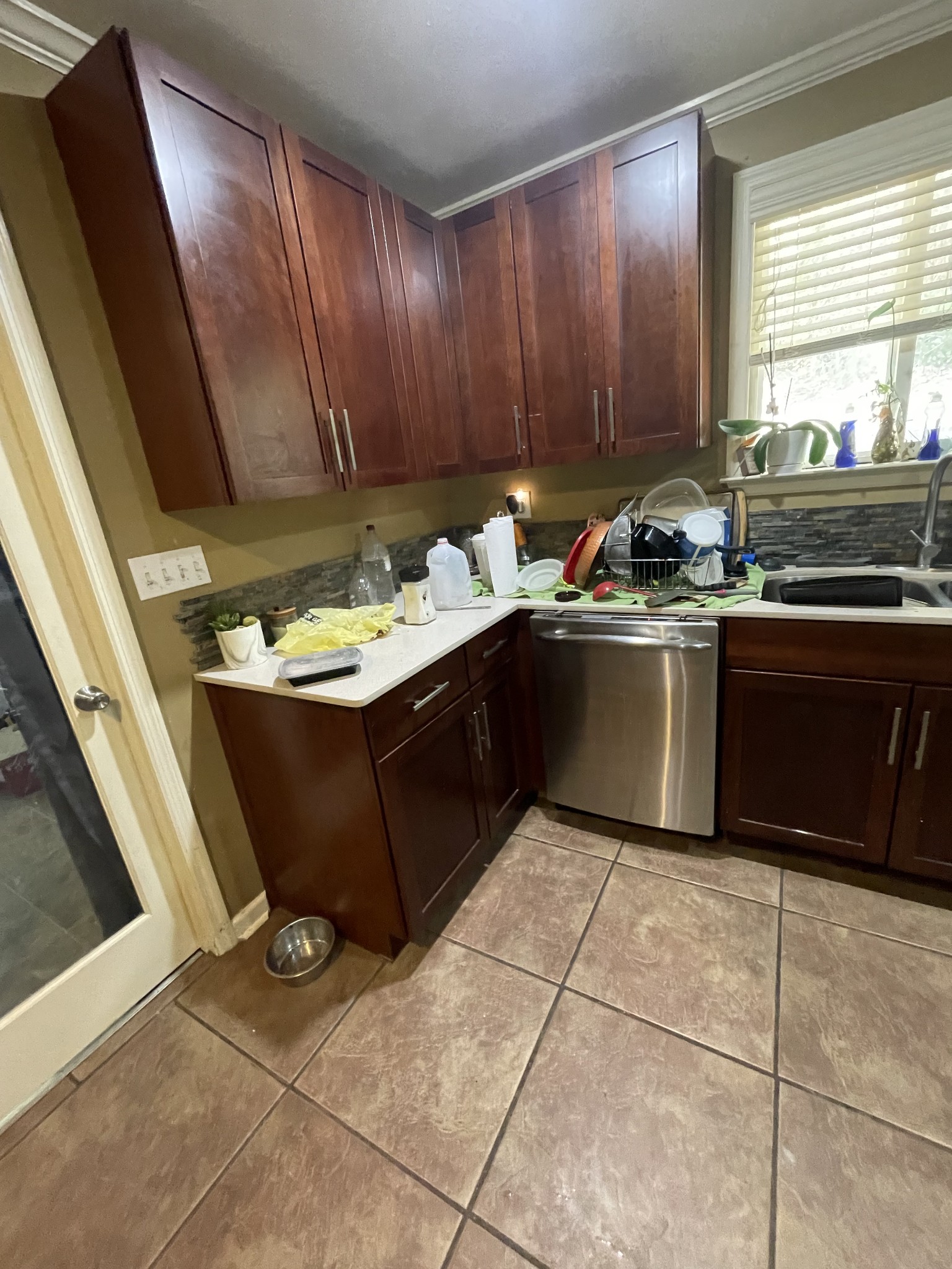 265 Harris Hollow Road Pleasant Shade, TN 37145 - Photo 3 of 15 a kitchen with a sink a stove a microwave oven and cabinets