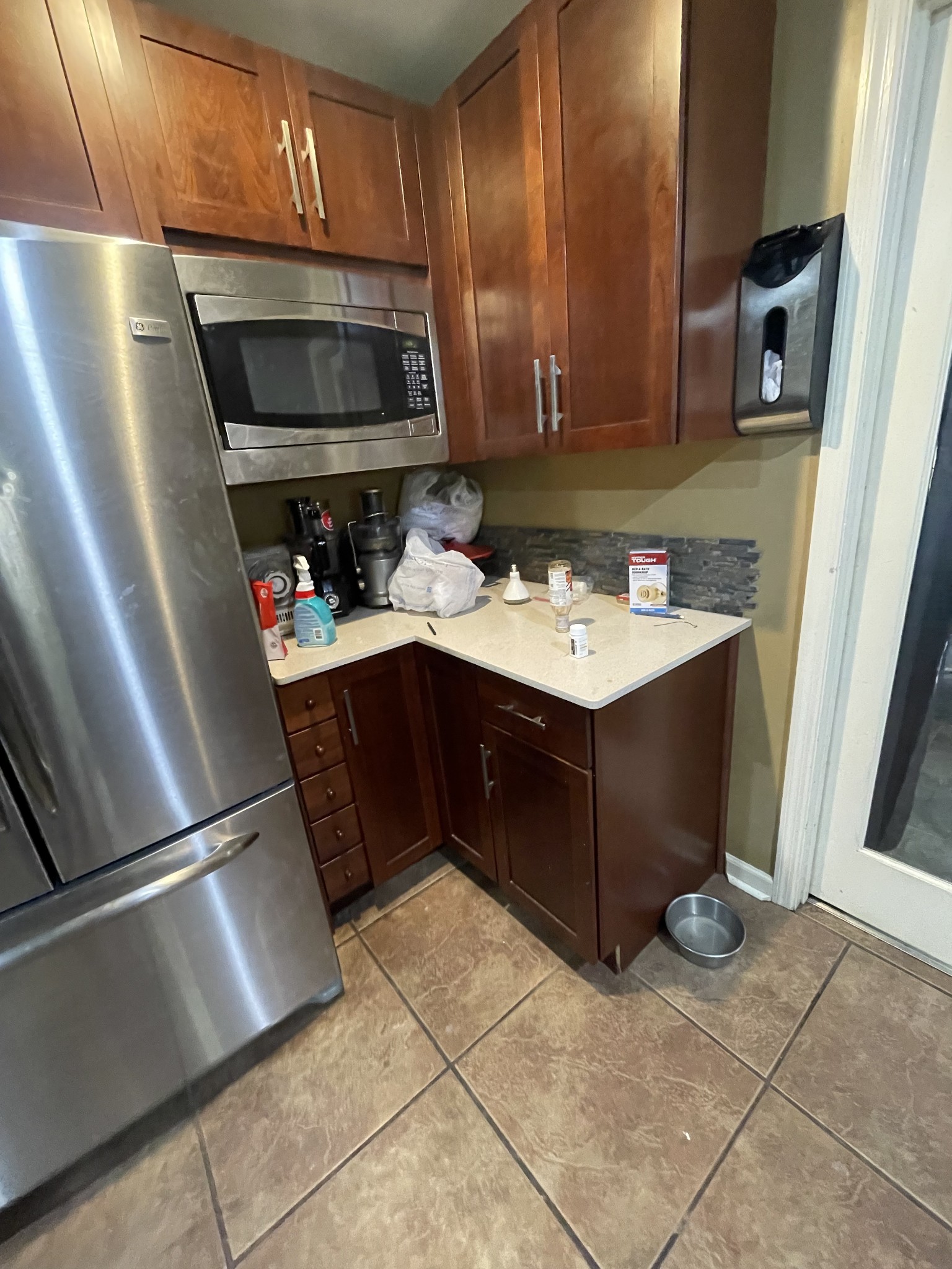 265 Harris Hollow Road Pleasant Shade, TN 37145 - Photo 4 of 15 a kitchen with stainless steel appliances granite countertop a refrigerator and a stove