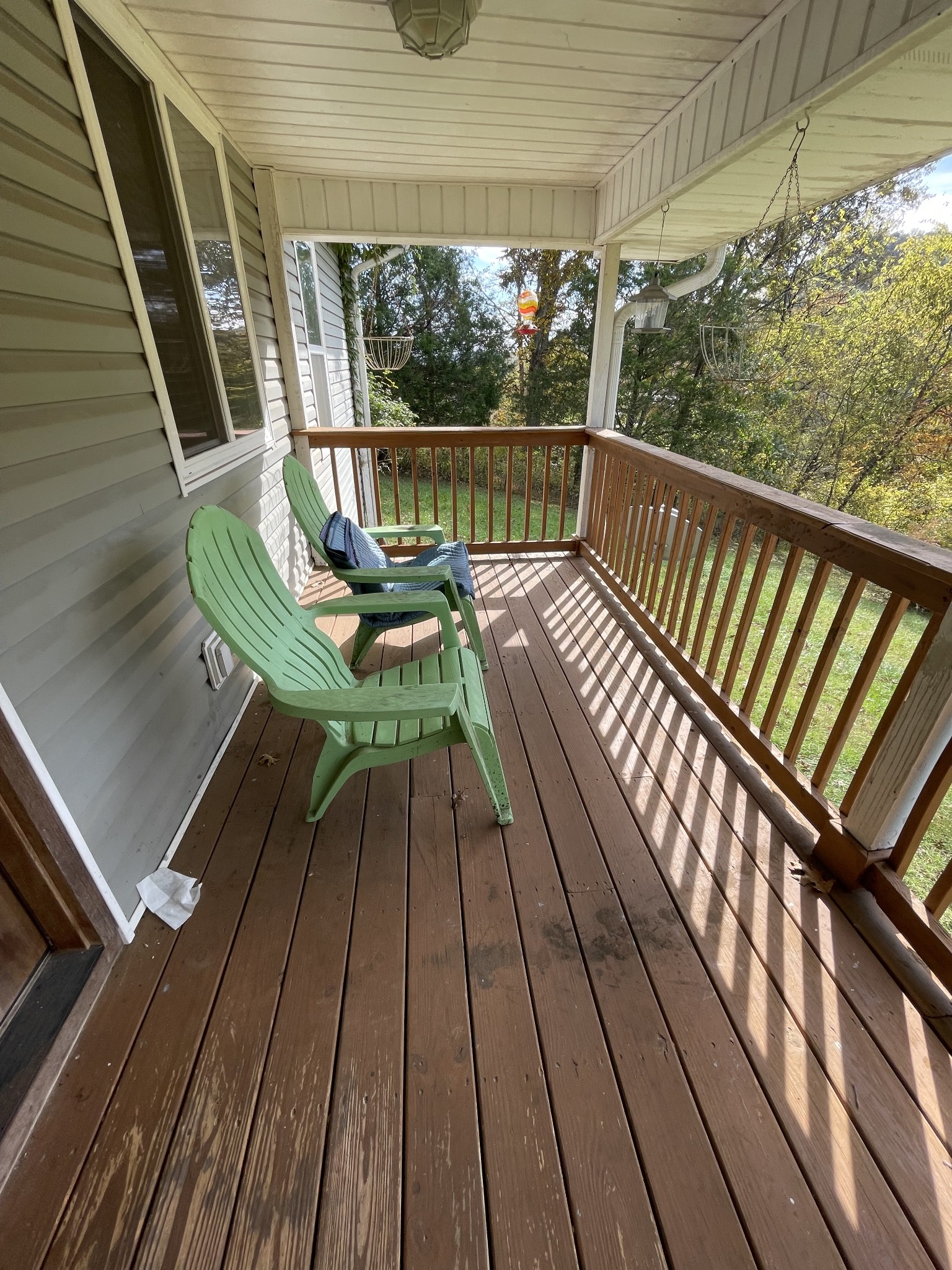 265 Harris Hollow Road Pleasant Shade, TN 37145 - Photo 9 of 15 a view of balcony with wooden floor and outdoor seating