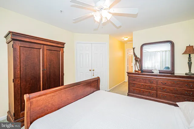 a view of a bathroom with a sink and a mirror