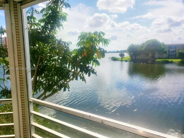 a view of a lake from a balcony