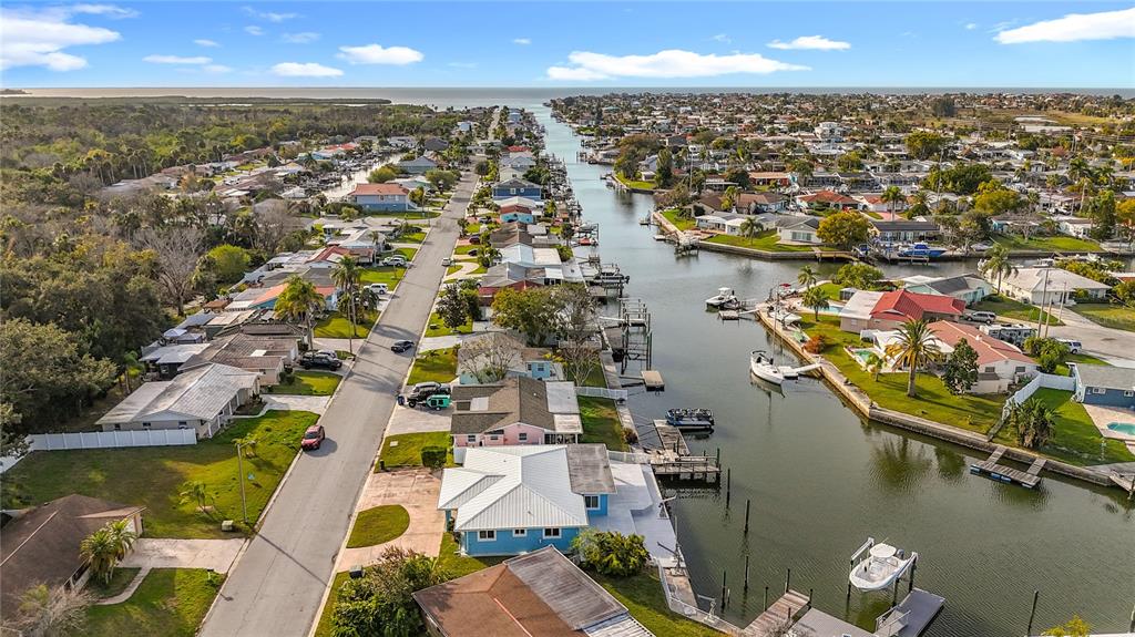 4869 Shell Stream Boulevard New Port Richey, FL 34652 - Photo 4 of 46 an aerial view of residential houses with outdoor space