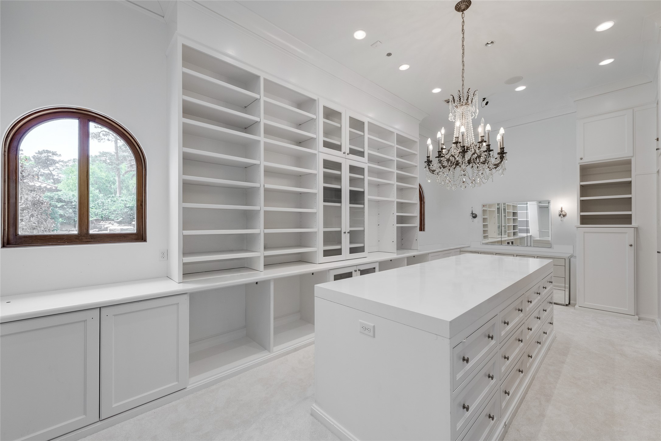 701 West Friar Tuck Lane Houston, TX 77024 - Photo 14 of 43 a view of a kitchen with a sink and chandelier