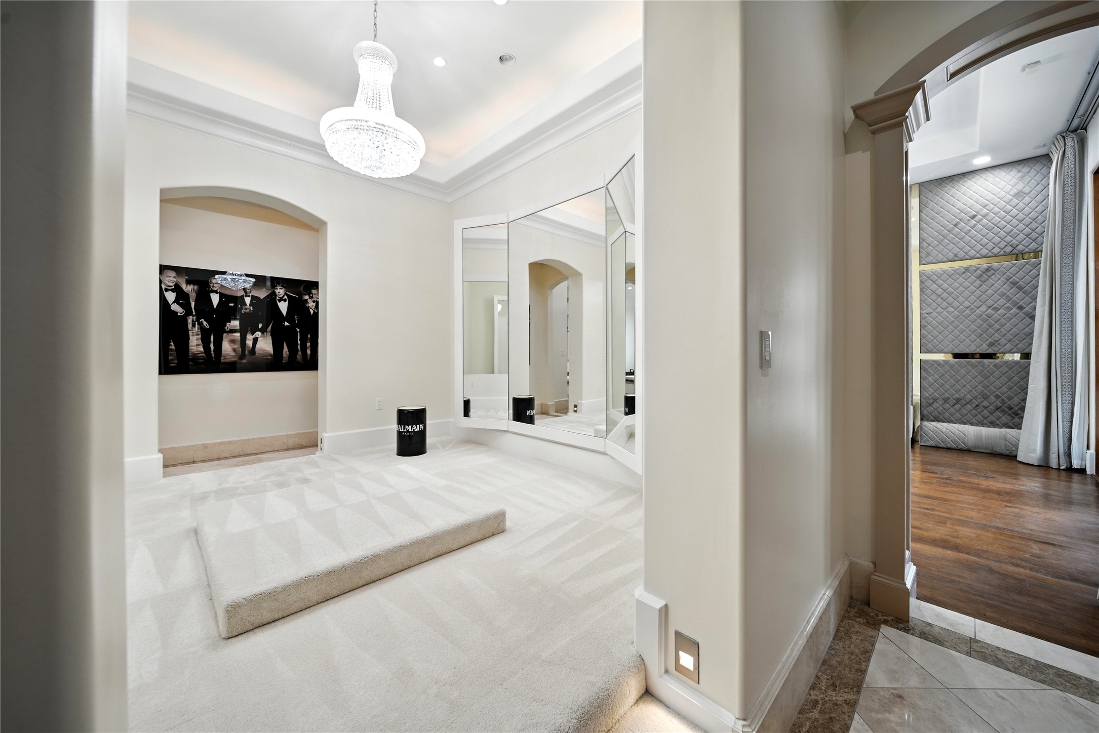 701 West Friar Tuck Lane Houston, TX 77024 - Photo 15 of 43 a view of a hallway with a livingroom and a bathroom with sink