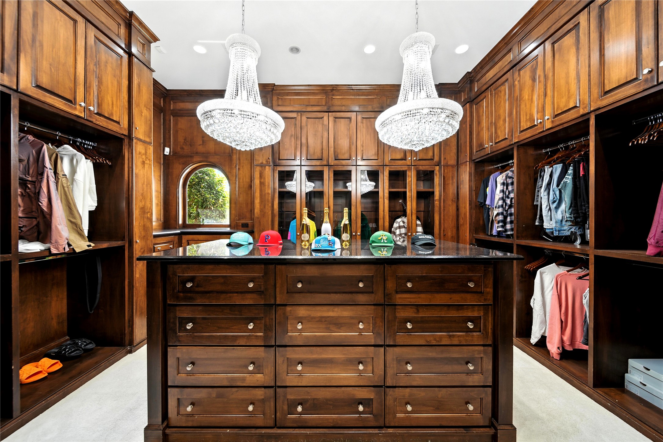 701 West Friar Tuck Lane Houston, TX 77024 - Photo 16 of 43 a room with a large space wooden floor and a chandelier