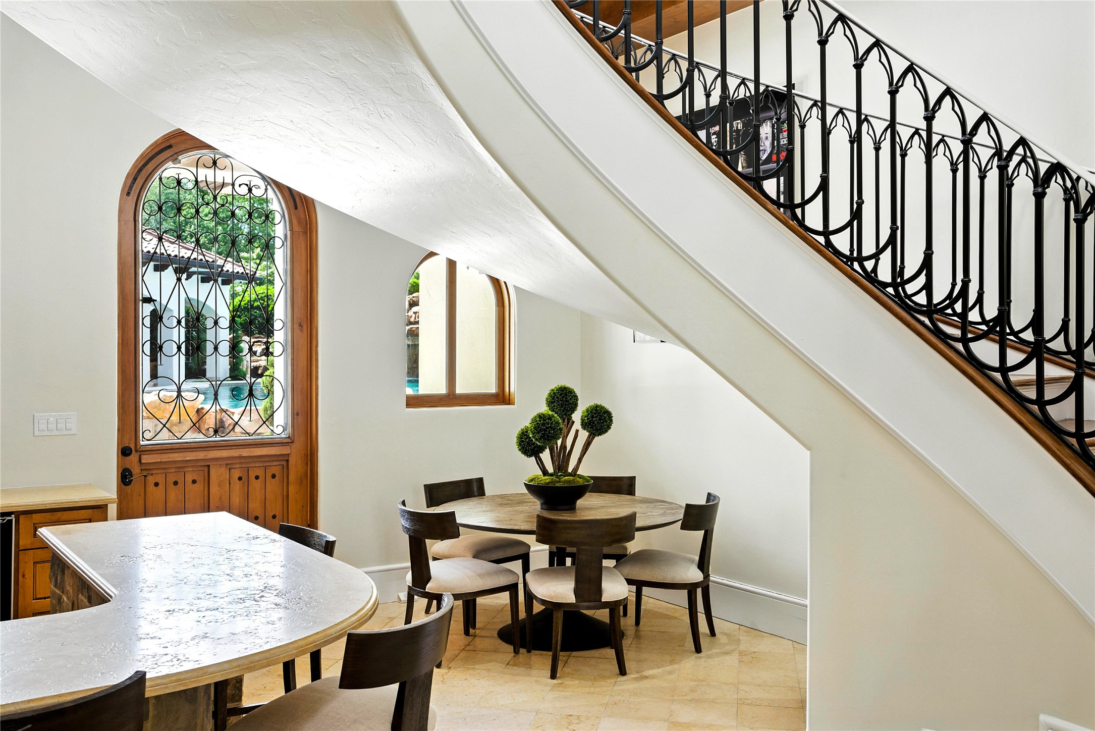 701 West Friar Tuck Lane Houston, TX 77024 - Photo 20 of 43 a view of a dining room with furniture and a window