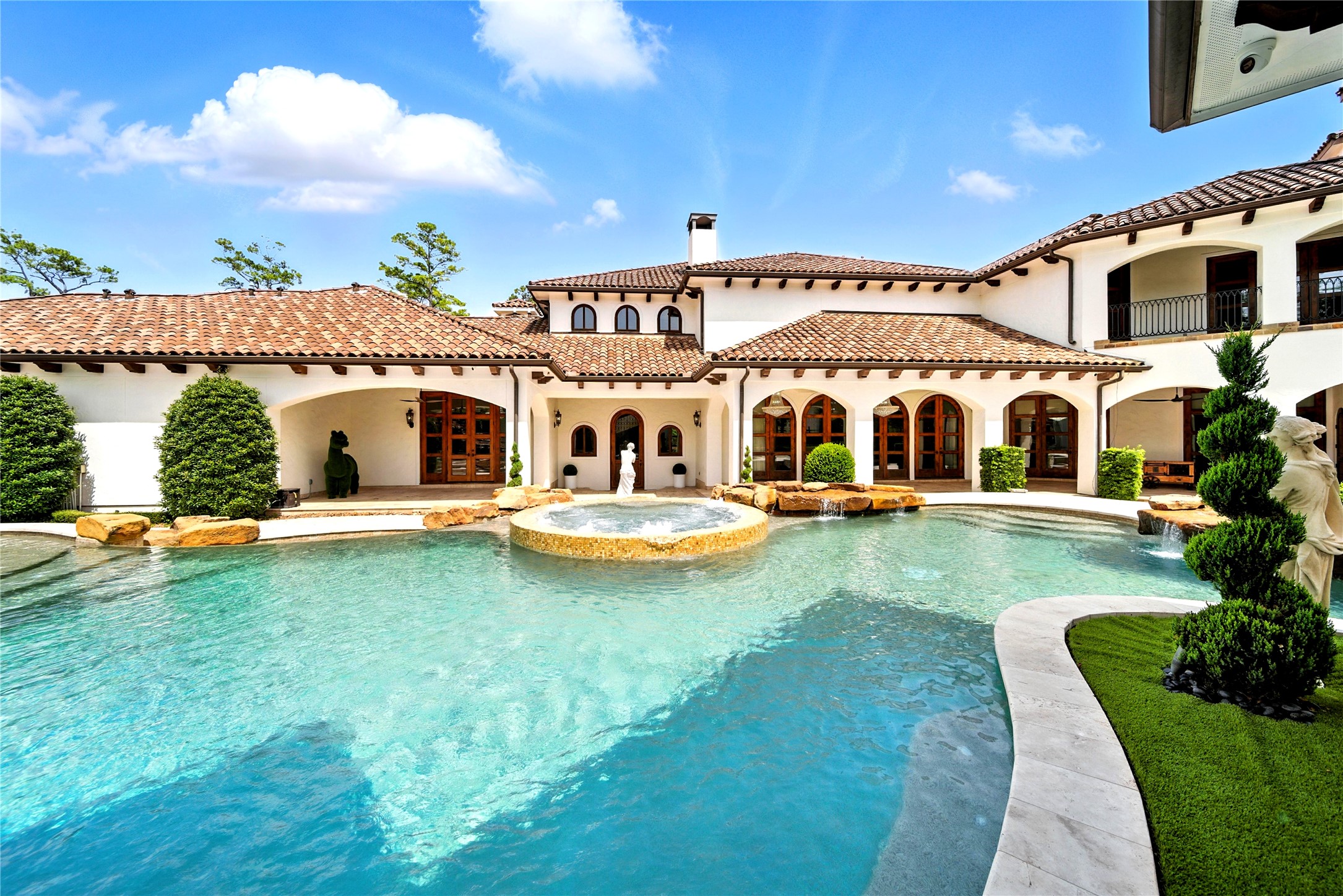 701 West Friar Tuck Lane Houston, TX 77024 - Photo 31 of 43 a view of a house with swimming pool and porch with furniture
