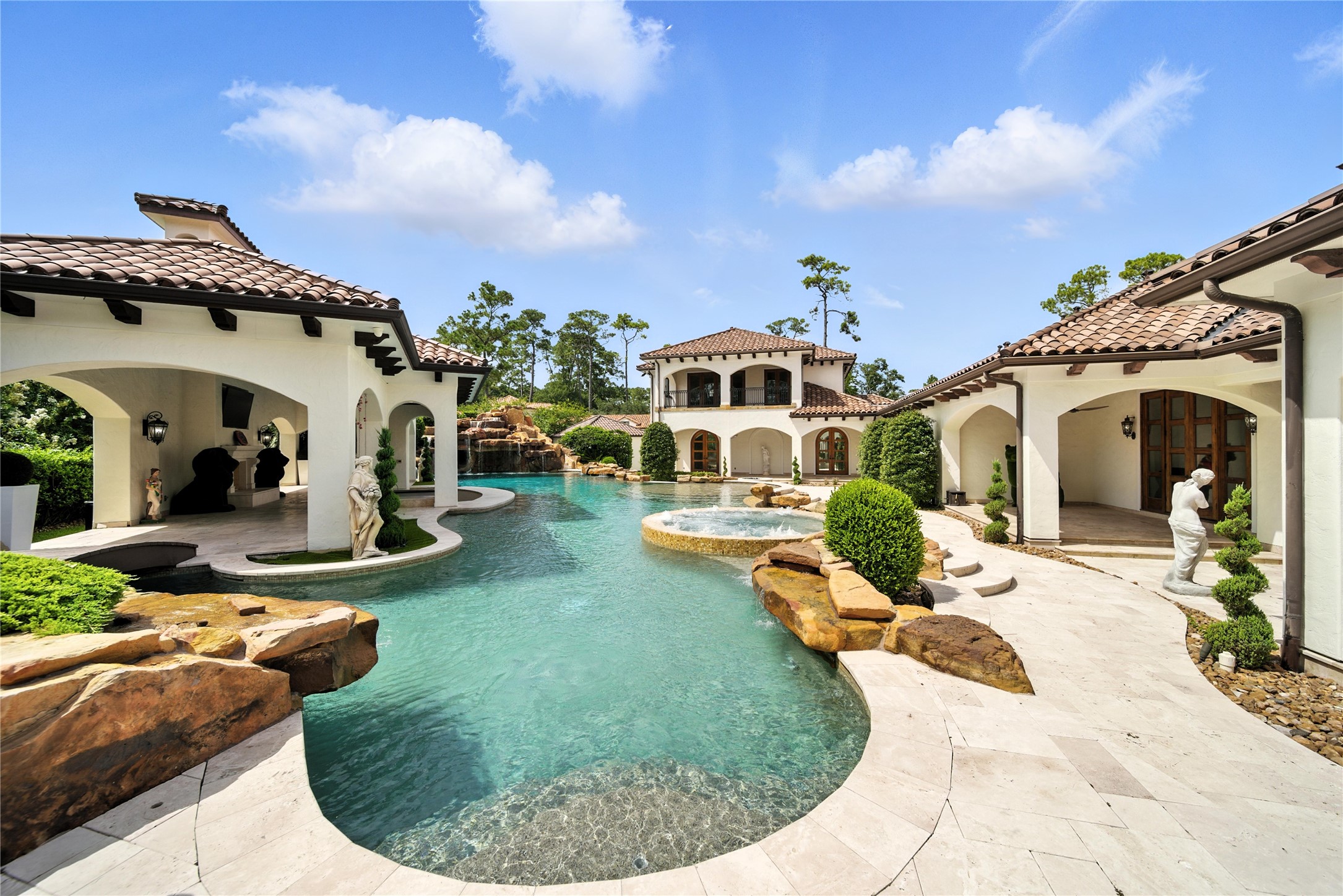 701 West Friar Tuck Lane Houston, TX 77024 - Photo 33 of 43 a view of a house with swimming pool and sitting area