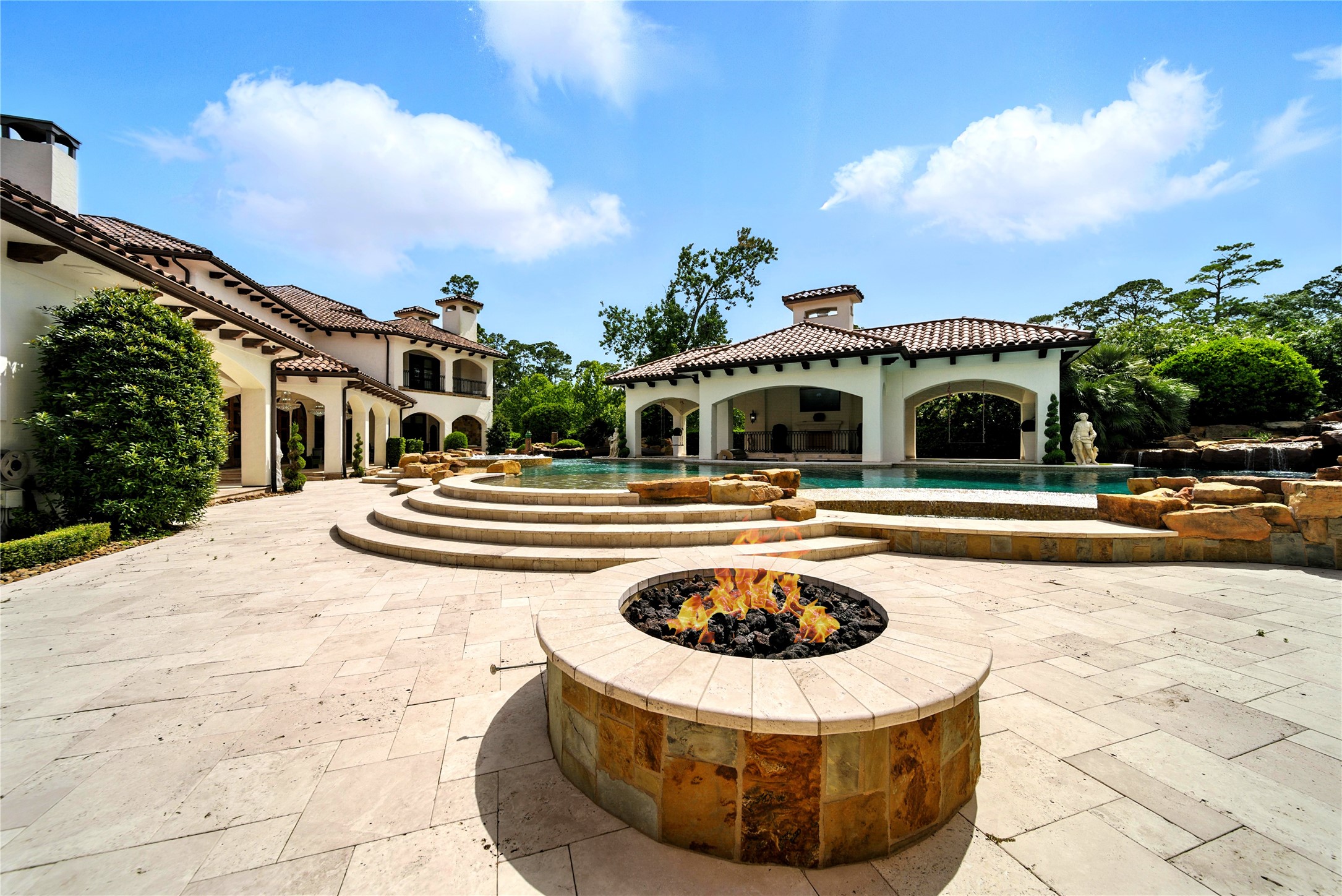 701 West Friar Tuck Lane Houston, TX 77024 - Photo 35 of 43 a swimming pool with outdoor seating and barbeque oven