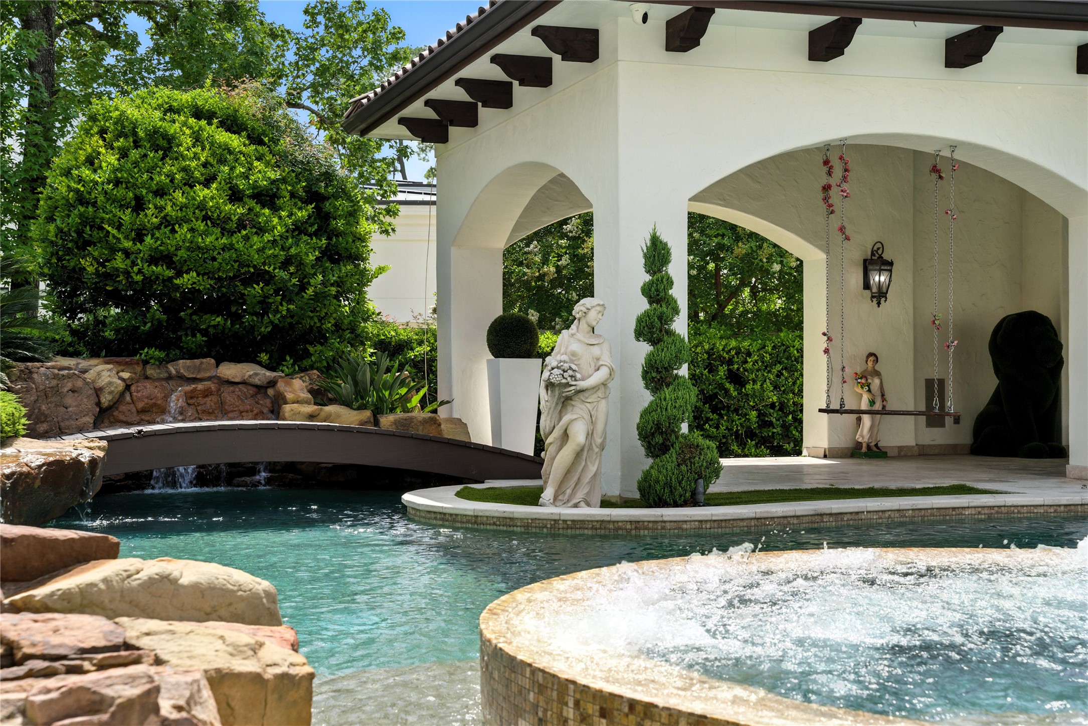 701 West Friar Tuck Lane Houston, TX 77024 - Photo 37 of 43 a view of a house with backyard and sitting area