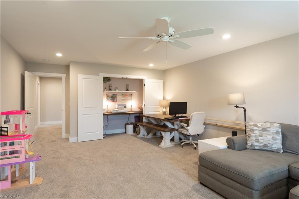 393 Scout Road Lexington, NC 27292 - Photo 43 of 47 View from the other end of the room. The closet has been converted into a sewing room. This space is listed as a 4th bedroom with the closet pictured here and an additional walk in (hideout) closet!