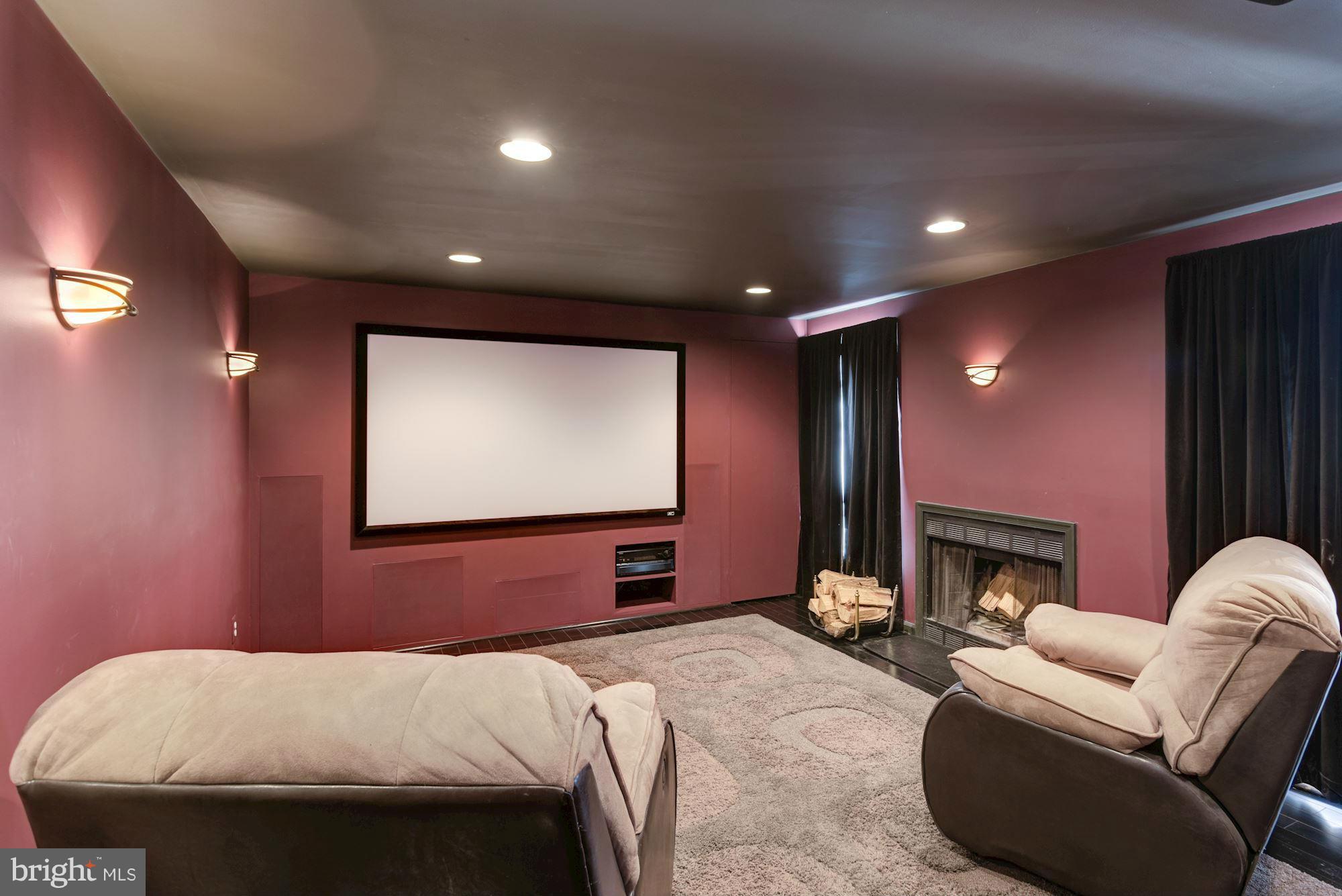 419 Davis Avenue Southwest Leesburg, VA 20175 - Photo 15 of 19 a bedroom with a bed and a fireplace