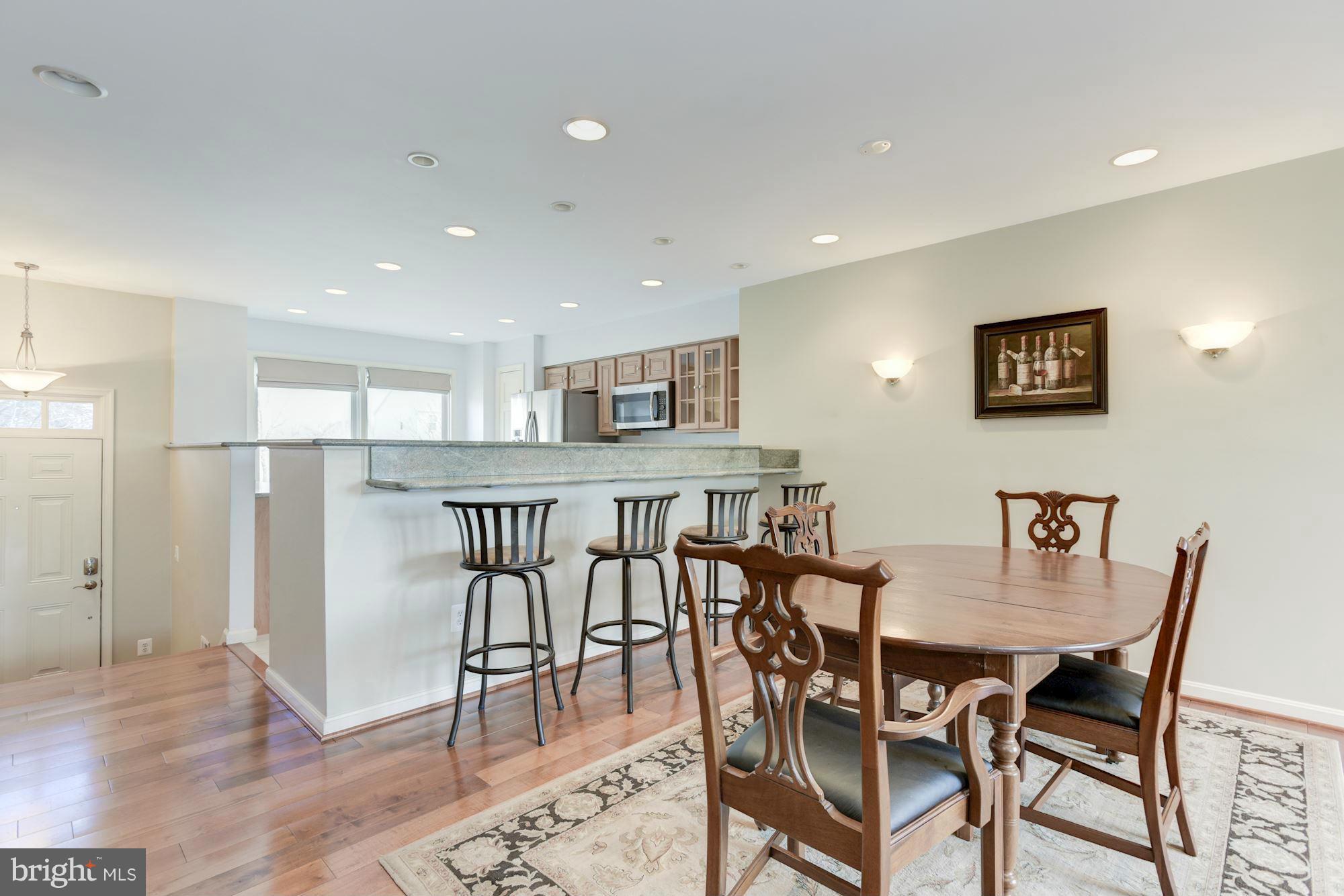 419 Davis Avenue Southwest Leesburg, VA 20175 - Photo 5 of 19 a view of a dining room with furniture