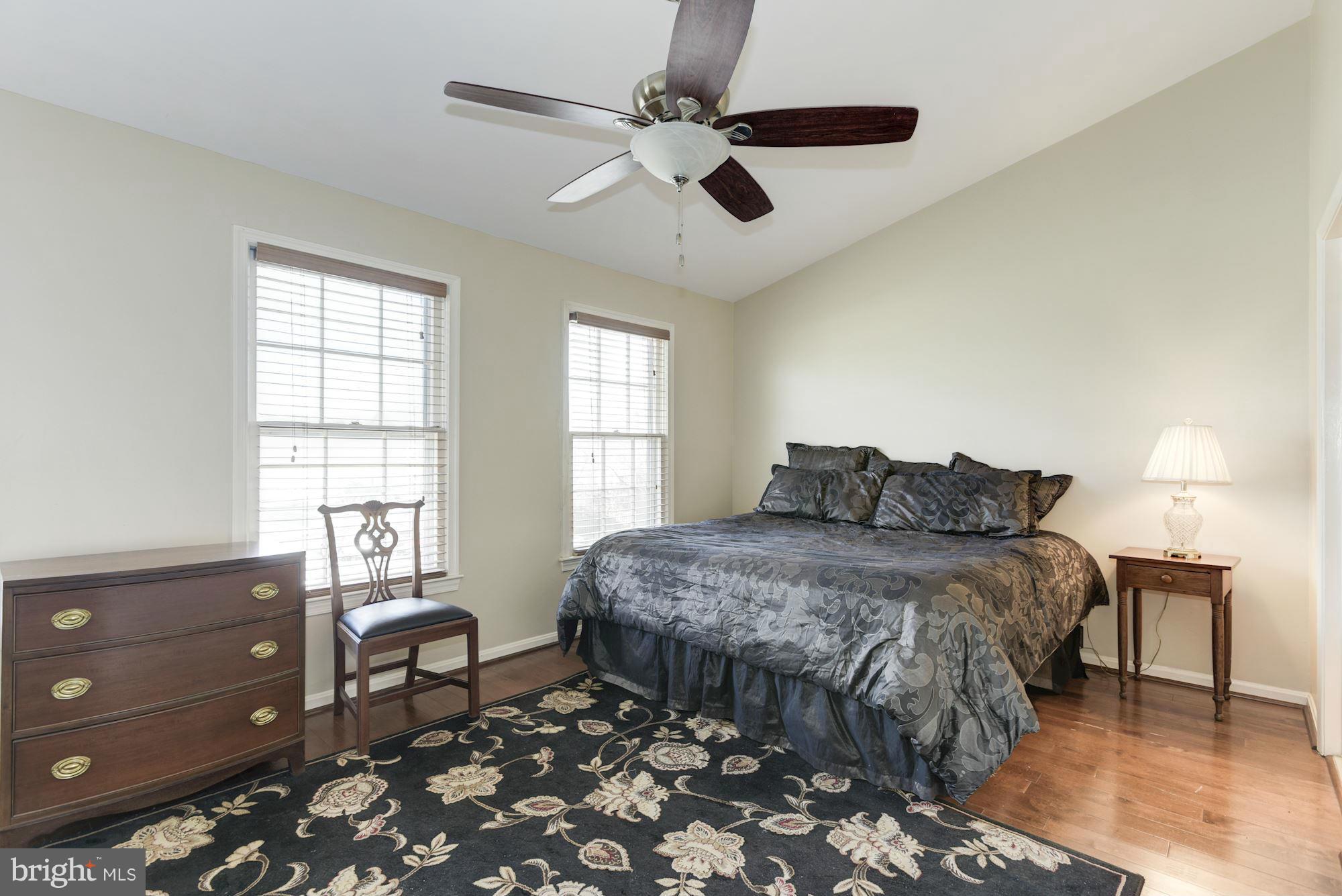 419 Davis Avenue Southwest Leesburg, VA 20175 - Photo 10 of 19 a bedroom with a bed and a window
