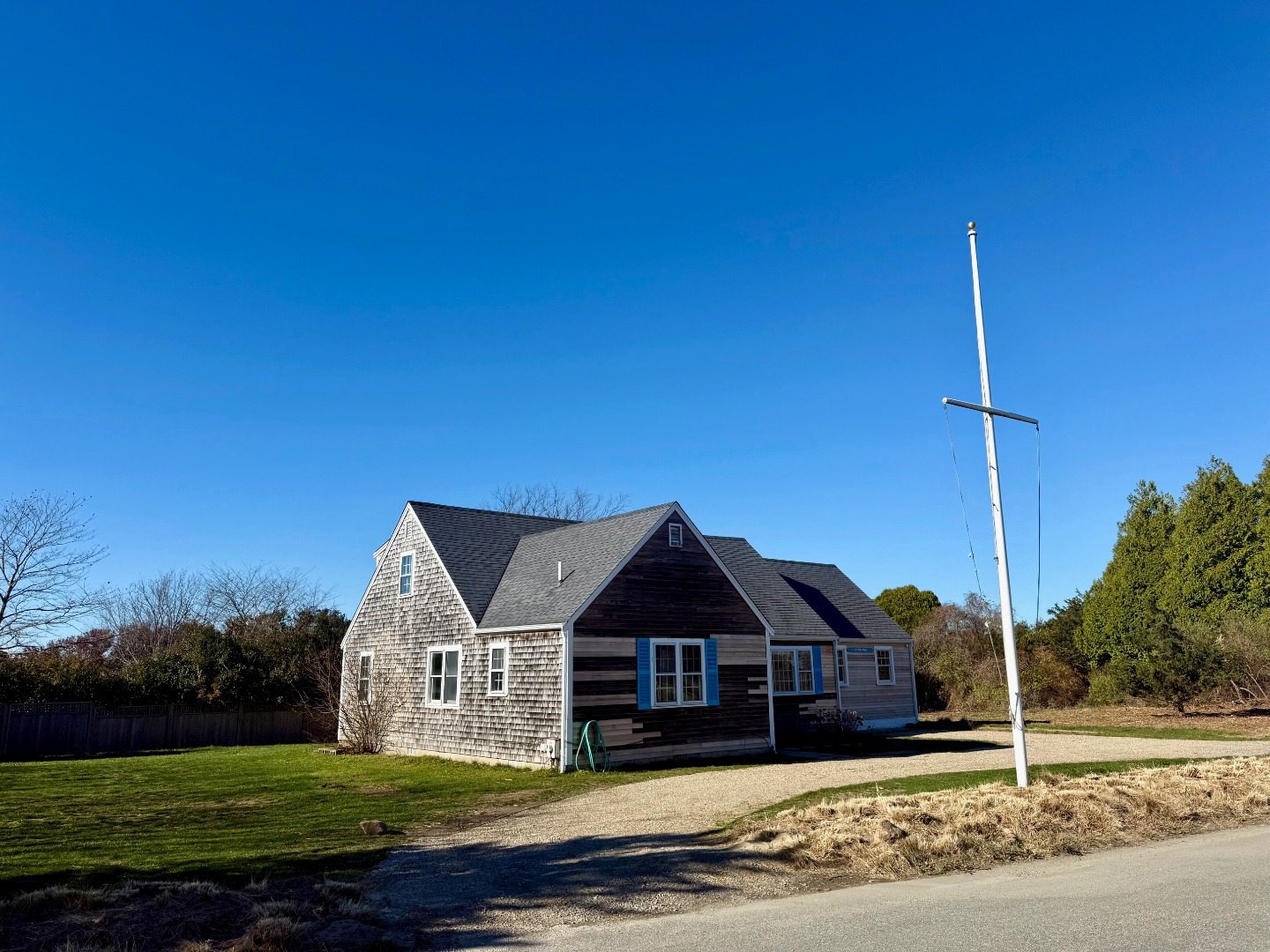 1 Pinkham Circle Nantucket, MA 02554 - Photo 12 of 12 a front view of a house with a yard