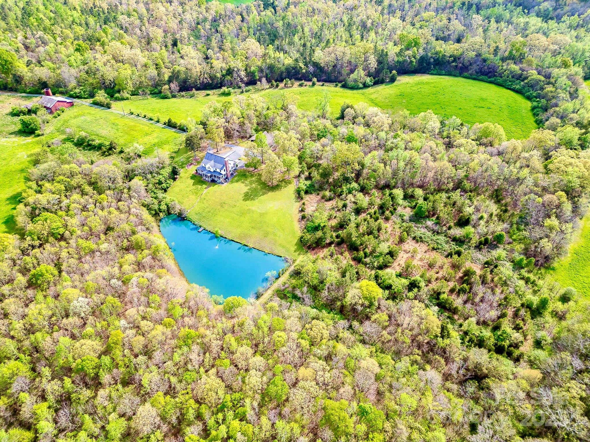 1151 Trull Hinson Road Wingate, NC 28174 - Photo 14 of 17 a view of a lake with a yard