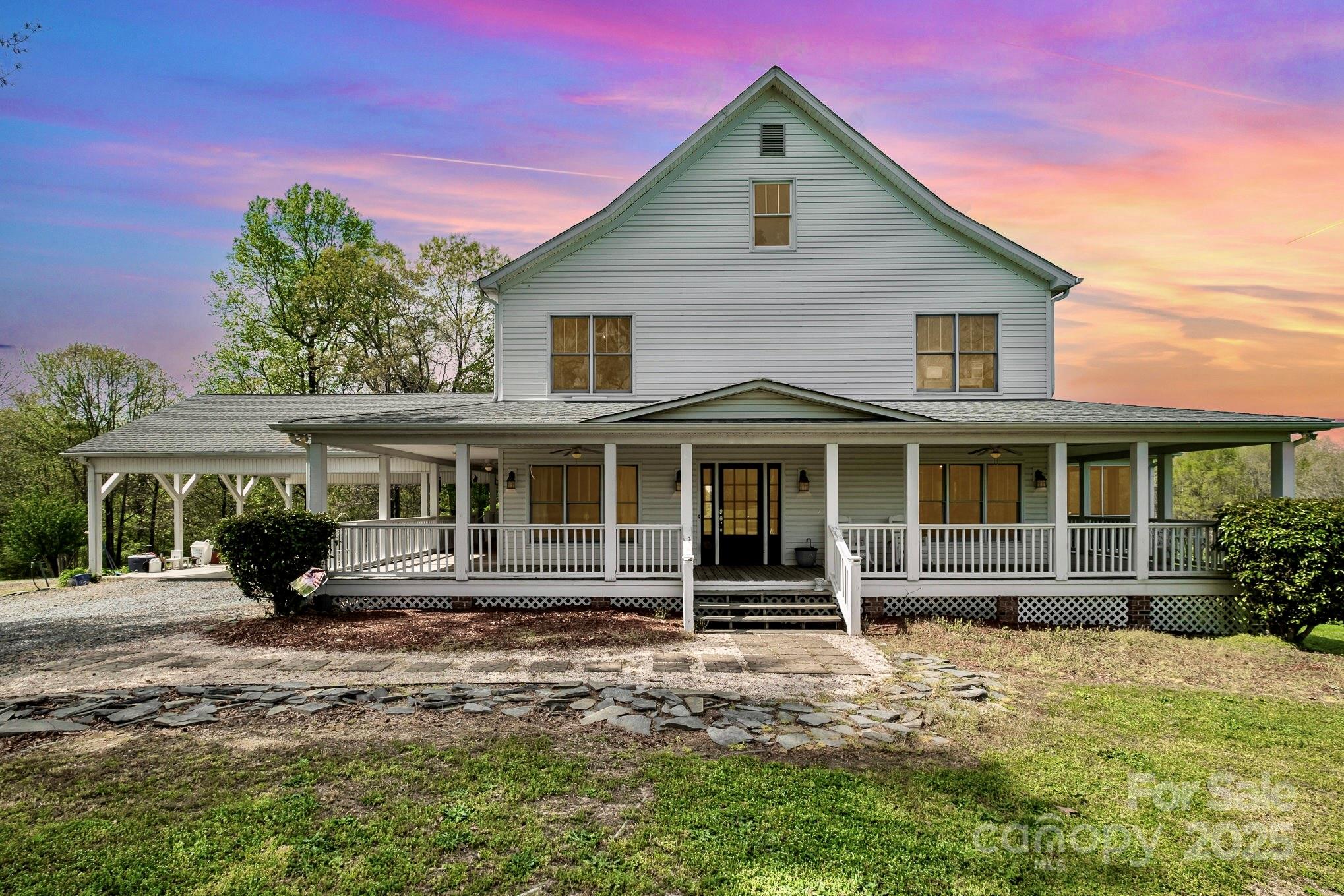 1151 Trull Hinson Road Wingate, NC 28174 - Photo 17 of 17 a front view of a house with a garden