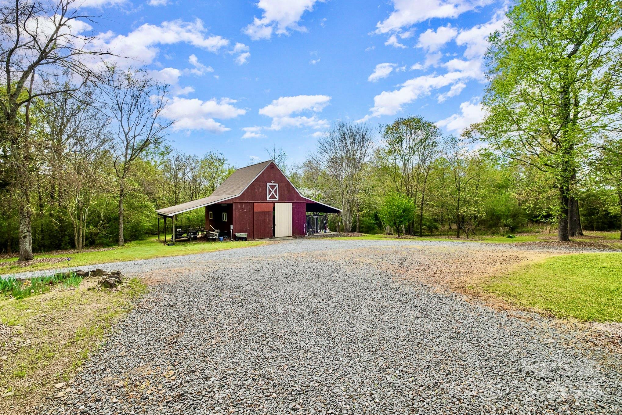 1151 Trull Hinson Road Wingate, NC 28174 - Photo 4 of 17 a front view of a house with yard