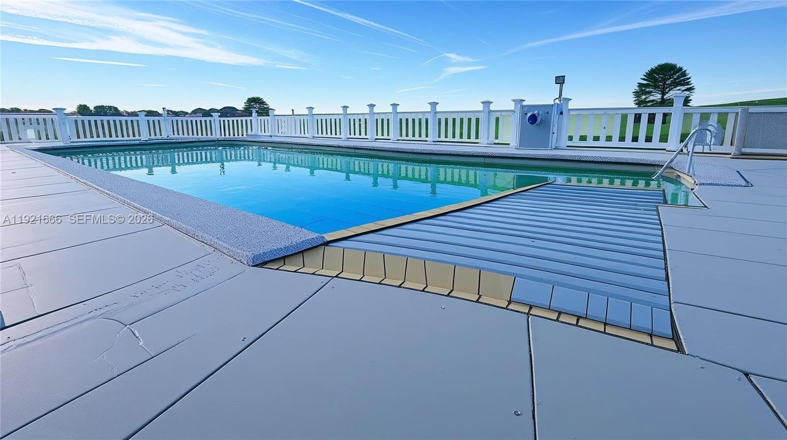 19870 Southwest 190th Street Miami, FL 33187 - Photo 8 of 31 a view of a balcony with two chairs