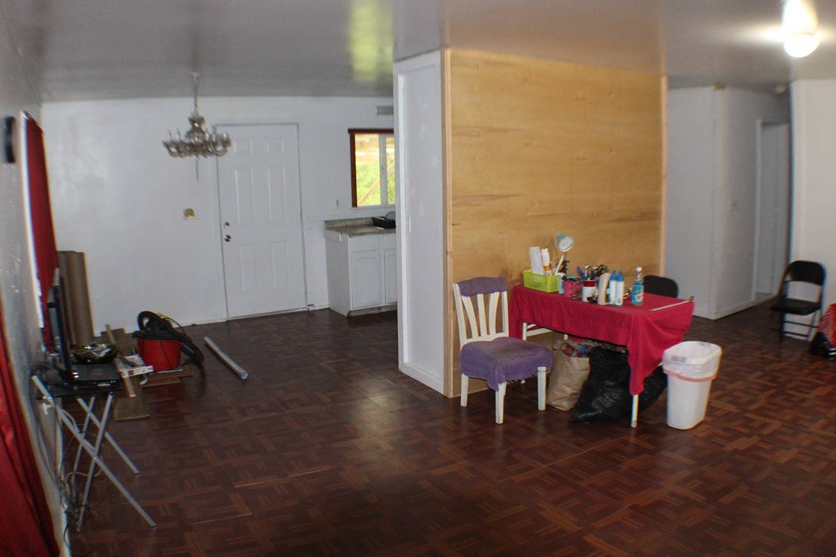 18-1248 Thorne Parkway Mountain View, HI 96771 - Photo 5 of 14 a view of a room with furniture and wooden floor