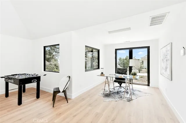 aerial view of a house with a city view