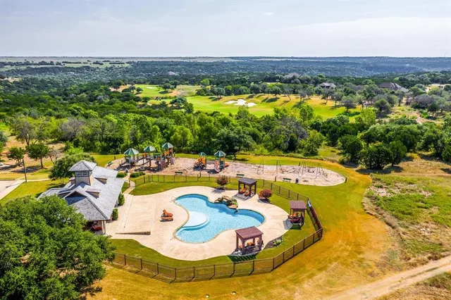 a view of swimming pool with an ocean view
