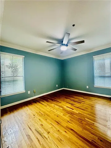 a spacious bathroom with a double vanity sink and a mirror