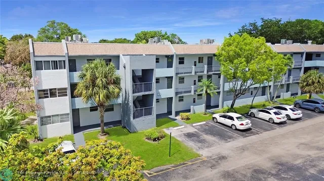 front view of a house with a garden
