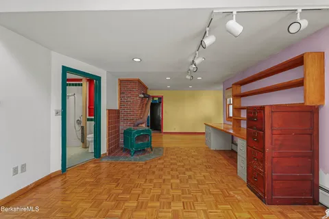 a view of an empty room with a balcony