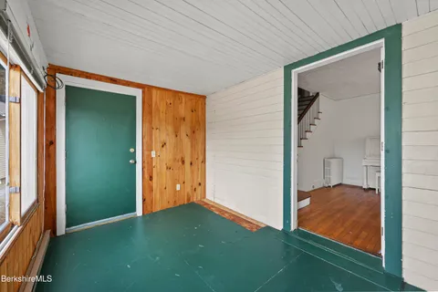 a kitchen with stainless steel appliances a stove a refrigerator sink and cabinets