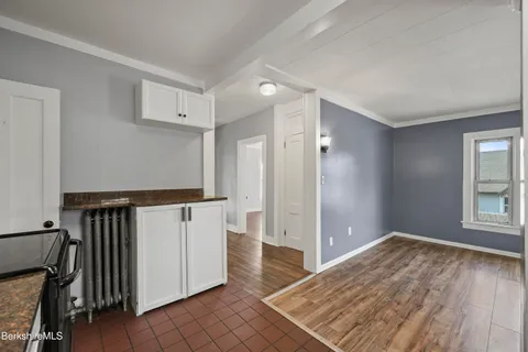 a bathroom with a tub and a window
