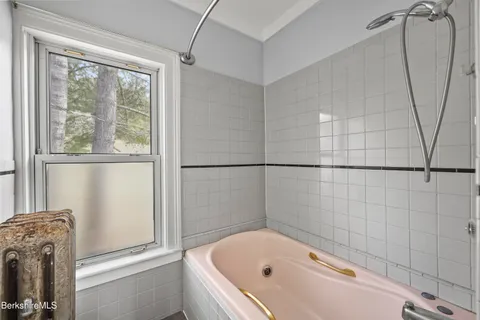 a view of a yard covered with snow