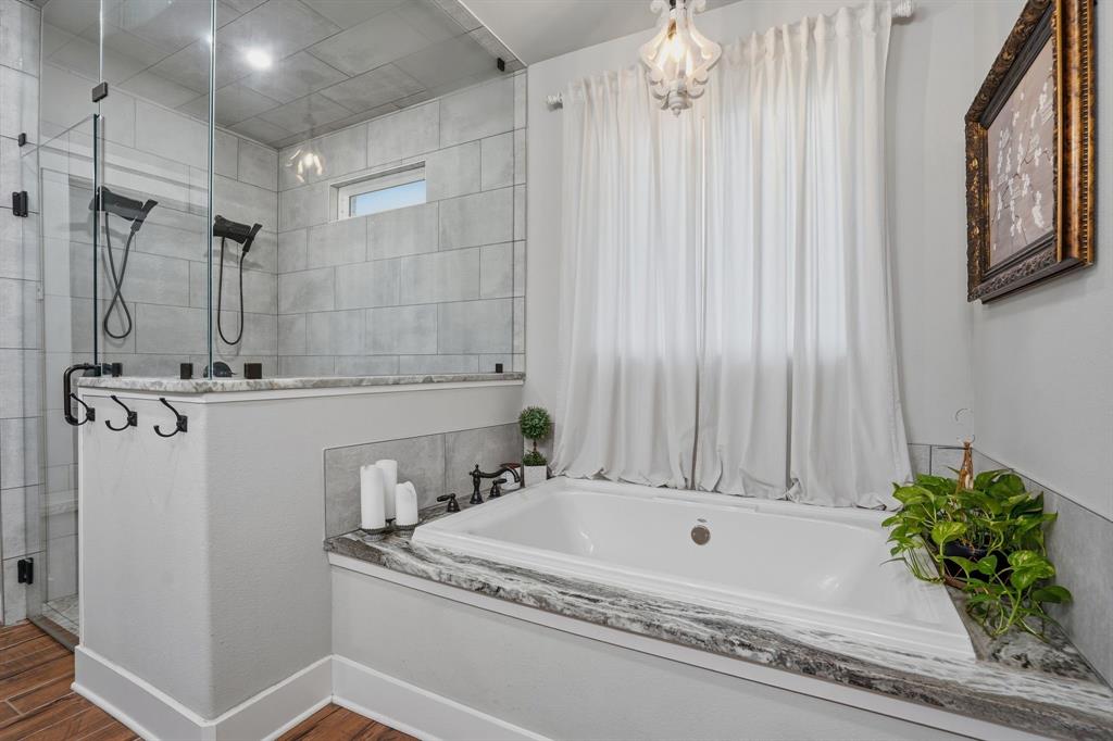 10210 Finch Road Sanger, TX 76266 - Photo 19 of 39 Primary bath with soaking tub and steam shower.