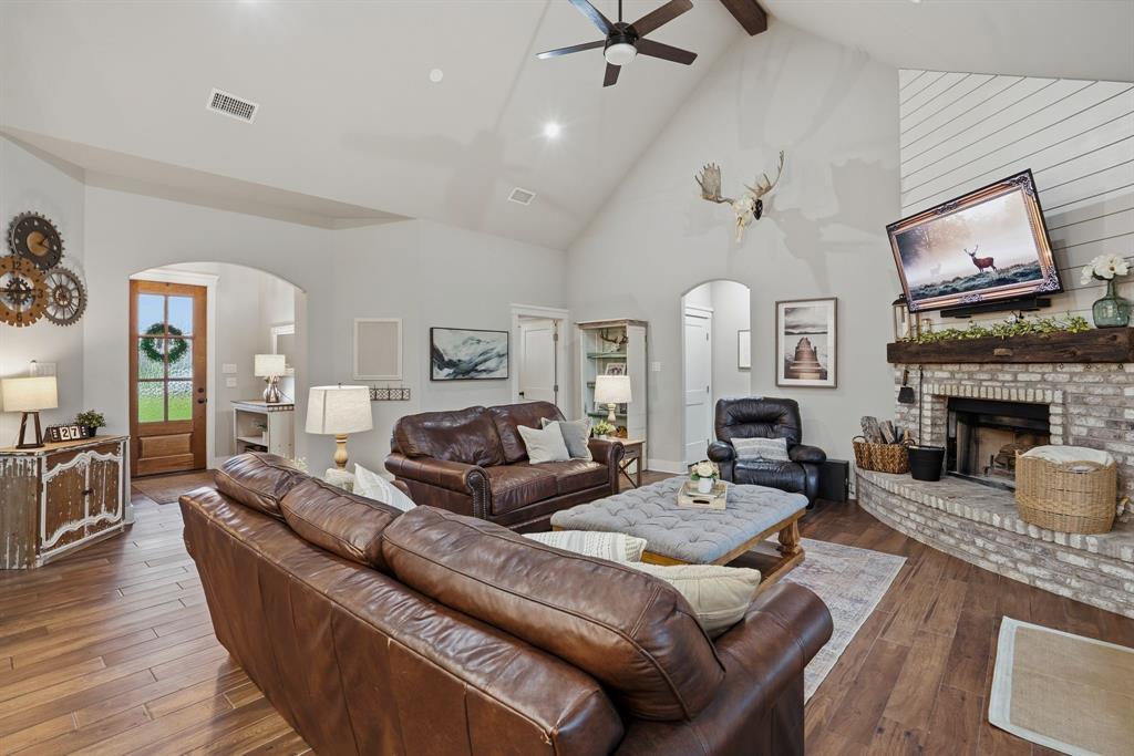 10210 Finch Road Sanger, TX 76266 - Photo 3 of 39 Large family room with wood burning fireplace