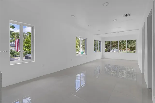 an empty room with windows