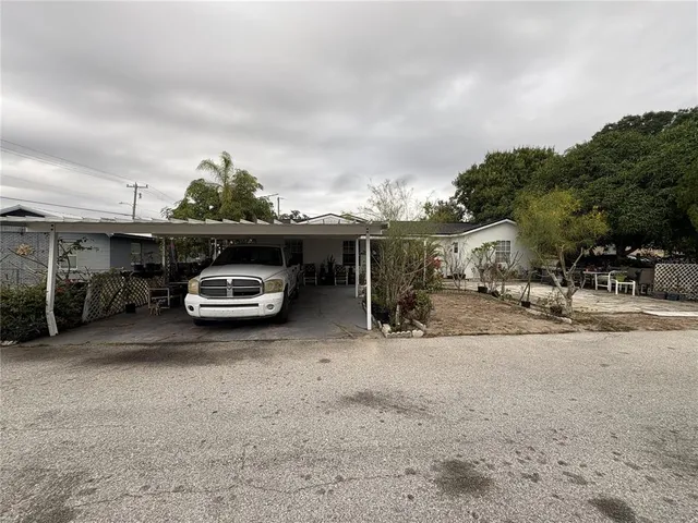 a car parked in front of a house