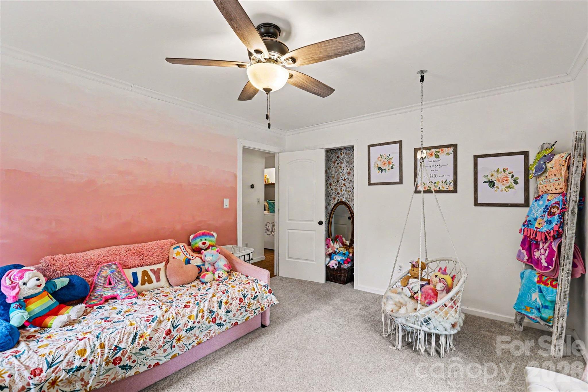 184 Canal Road Belmont, NC 28012 - Photo 34 of 39 a bedroom with bed and chandelier