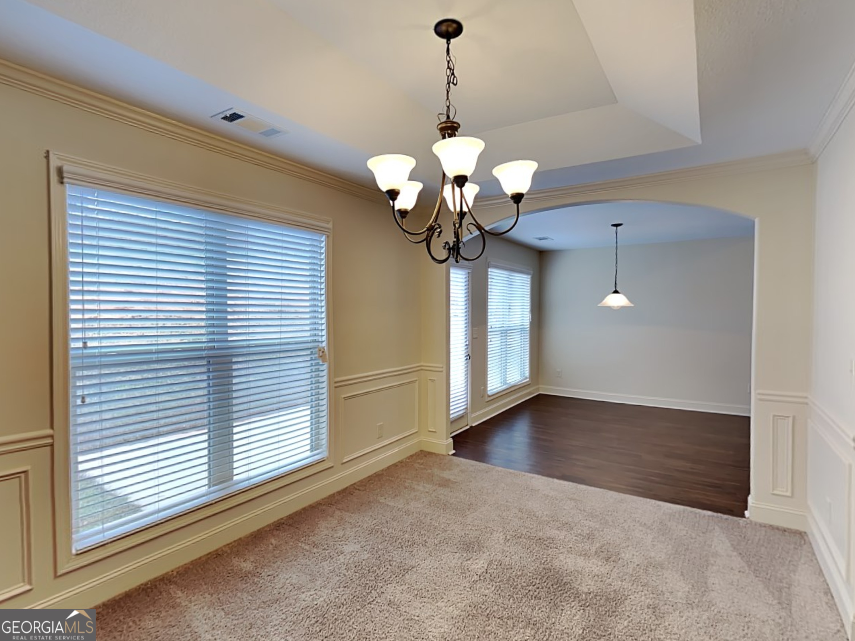 578 River Mist Circle Jefferson, GA 30549 - Photo 4 of 23 a view of a room with a chandelier and a large window