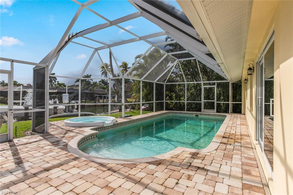 2155 Tarpon Road Naples, FL 34102 - Photo 22 of 24 a view of a backyard